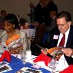 Business People reading River Walk Magazine